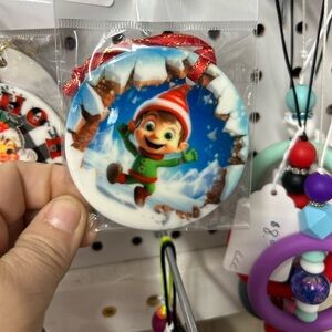 Festive Elf Ornament with Red Ribbon